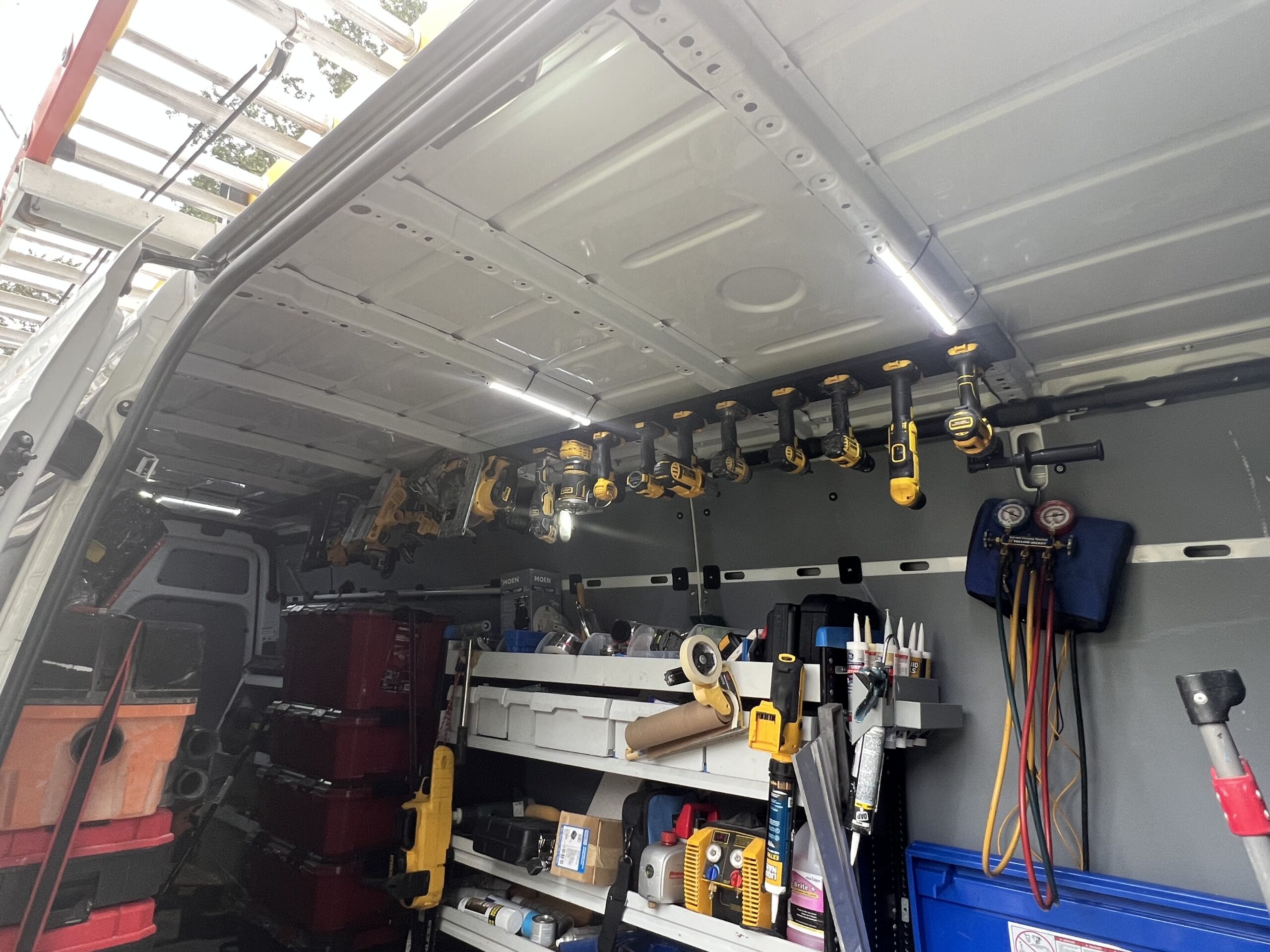 Organized professional tools inside a Scott The Handyman mobile maintenance shop